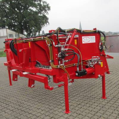 Wiesel 2400 attached to front loader, especially for winding greenhouse film